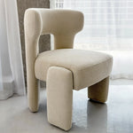 Load image into Gallery viewer, Soft foam dining chair with a stylish design, blending effortlessly into a modern dining room decor.
