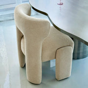 The Baloud foam dining chair, combining plush cushioning with modern aesthetics in a bright dining area.