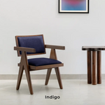 Load image into Gallery viewer, The Pierre wood frame dining chair in a sophisticated dining space, blending classic and modern styles.
