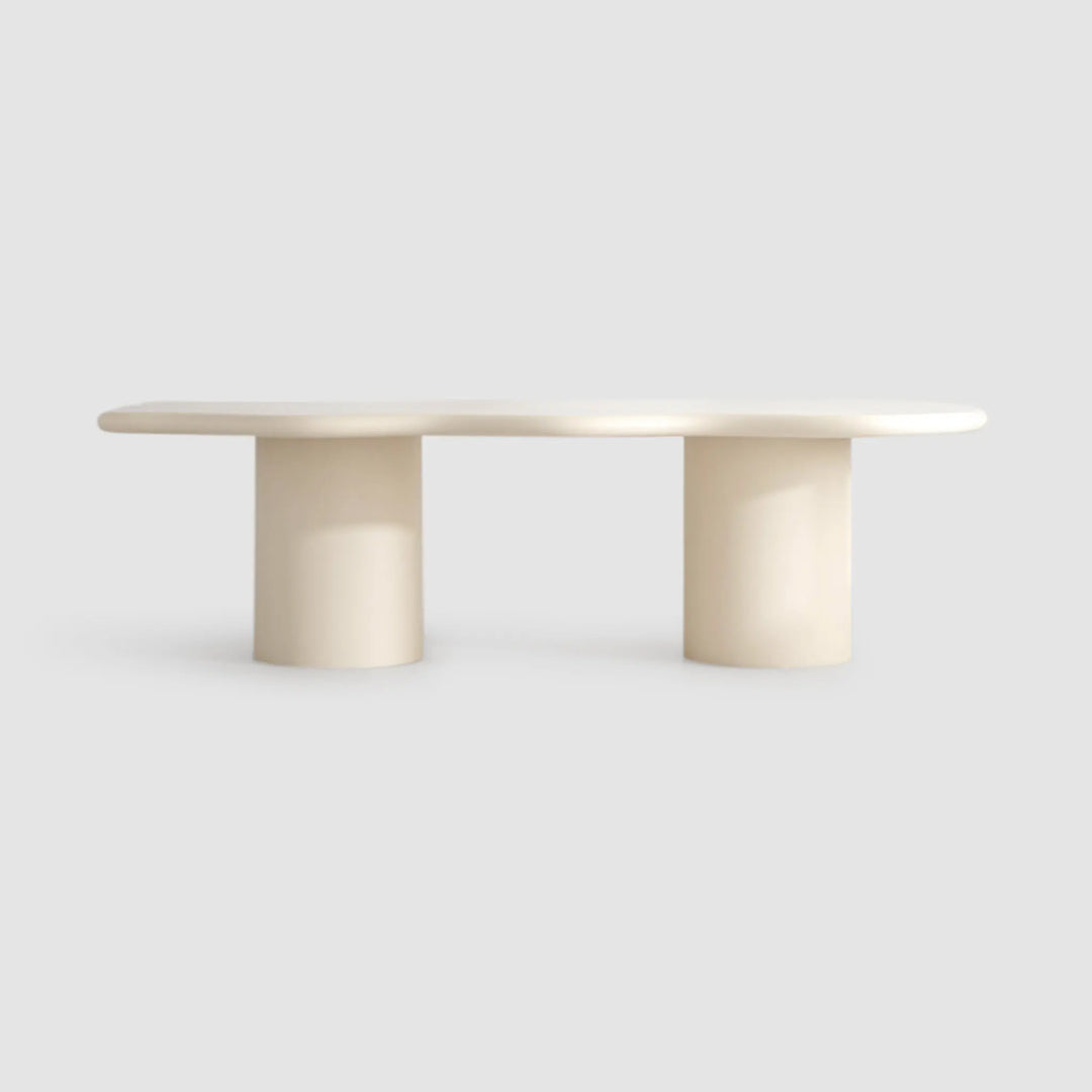 Stylish 6 seater dining table with a curvy microplaster surface, ideal for creating a focal point in any room.