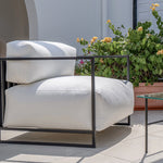 Load image into Gallery viewer, Elegant outdoor sofa set styled in a modern Dubai terrace, featuring The Dexter Two Seater.
