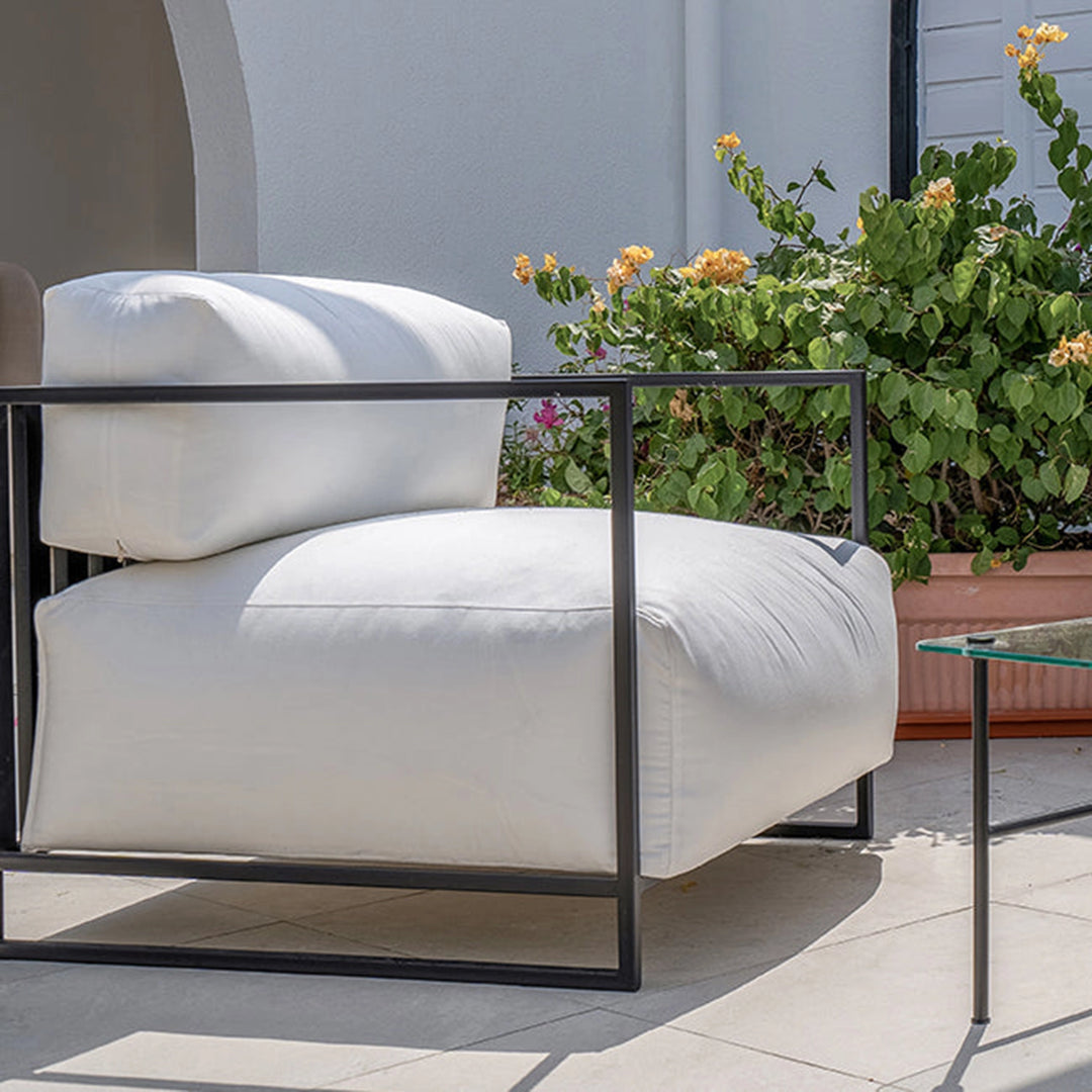 Elegant outdoor sofa set styled in a modern Dubai terrace, featuring The Dexter Two Seater.