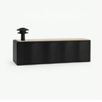Load image into Gallery viewer, The Kelly black TV unit, blending seamlessly into modern interior decor with a bold look.
