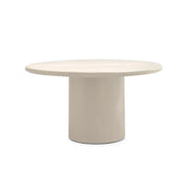The Marx Microplaster round dining table with a sleek design, perfect for modern interiors.