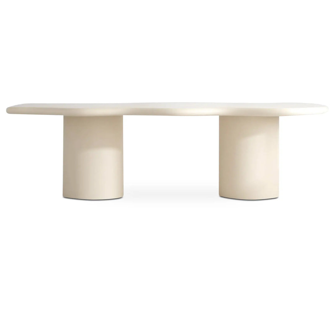 The Victoria Curvy 6 seater dining table in microplaster, perfect for modern and spacious dining rooms.