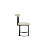 Load image into Gallery viewer, The Claudia round dining chair with a sleek, modern design, perfect for contemporary dining spaces.
