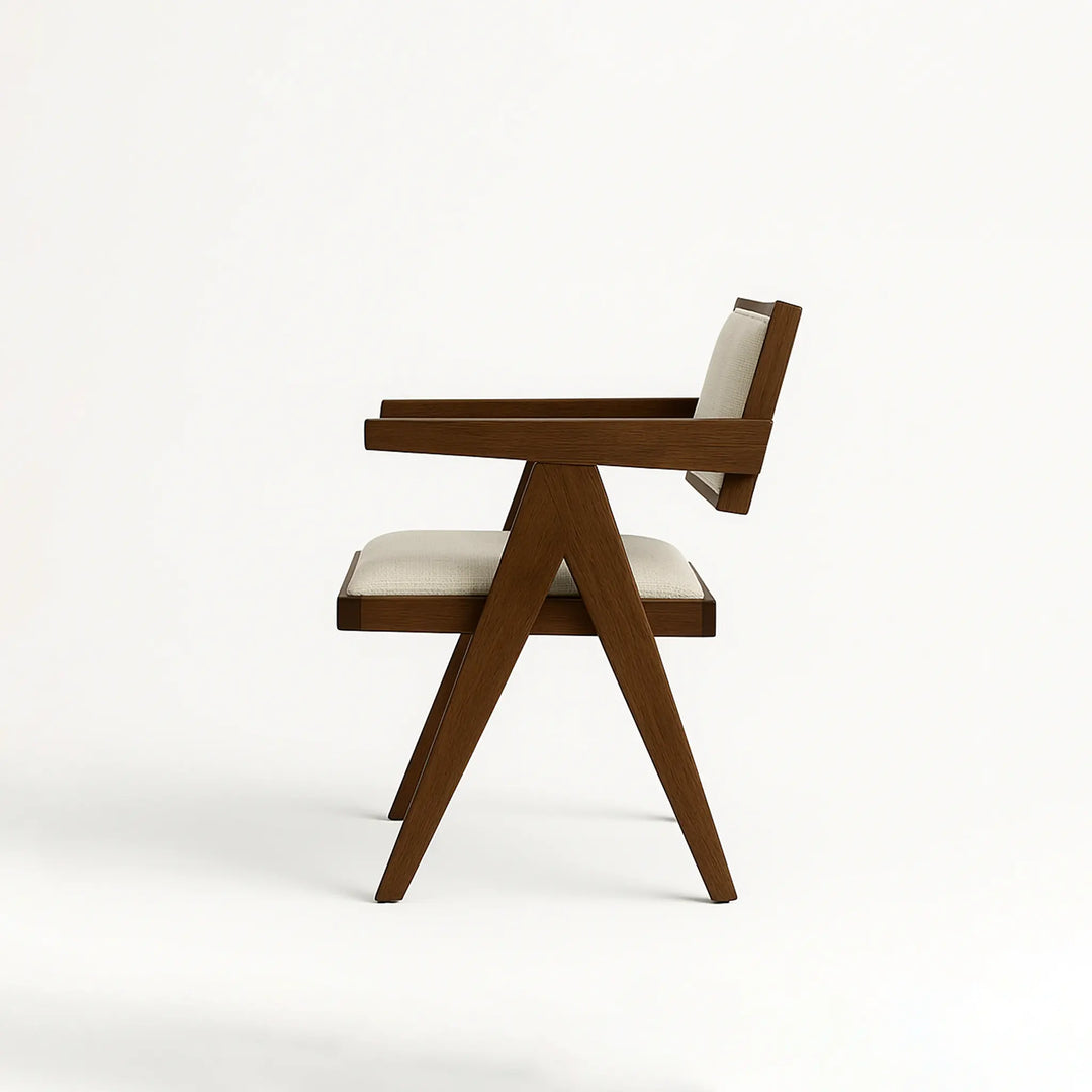 The Pierre dining chair with a solid wood frame, adding a rustic yet refined touch to any dining area.