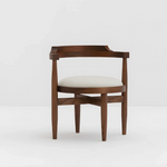 Load image into Gallery viewer, The Naomi wooden chair in a neutral grey background, highlighting its simple yet elegant craftsmanship.
