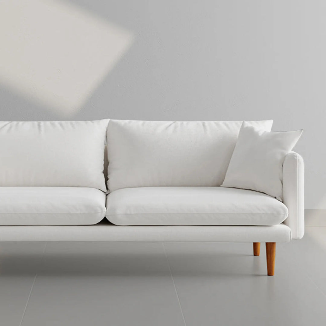 The Robin premium sofa styled in a minimalist home, offering timeless elegance.