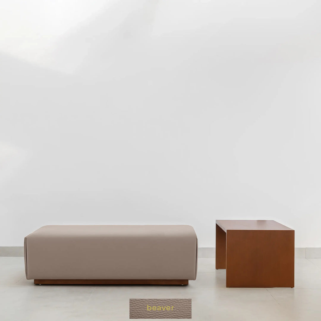 Sebastian Coffee Table paired with Italian ottoman in elegant beaver fabric.