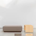 Load image into Gallery viewer, Italian ottoman and Sebastian Coffee Table in modern heaver fabric design and honey coler coffe table.
