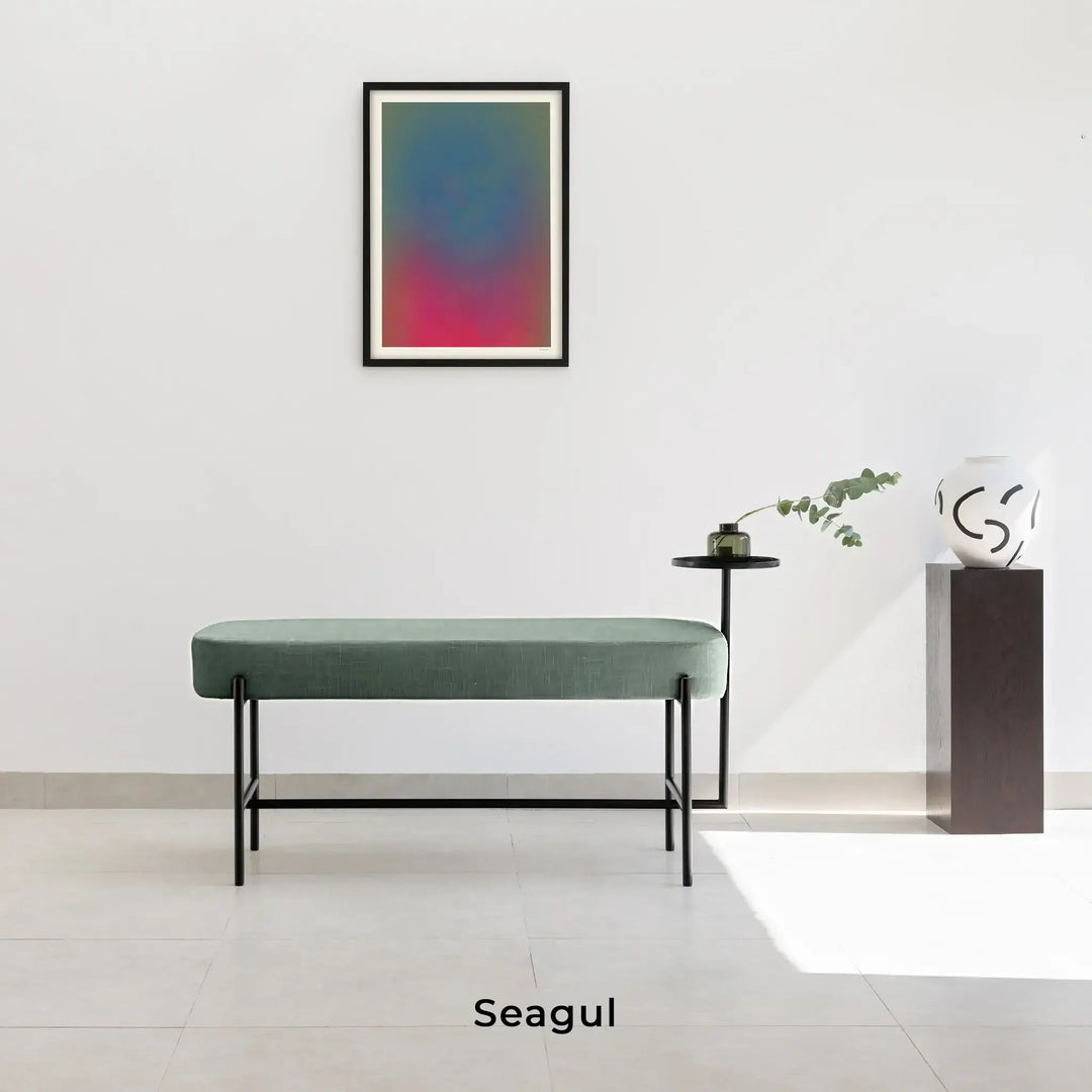 The Danielle Bench in seagull green fabric.