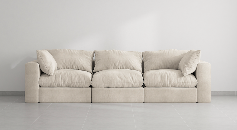 The Avis Feather Couch in Curve